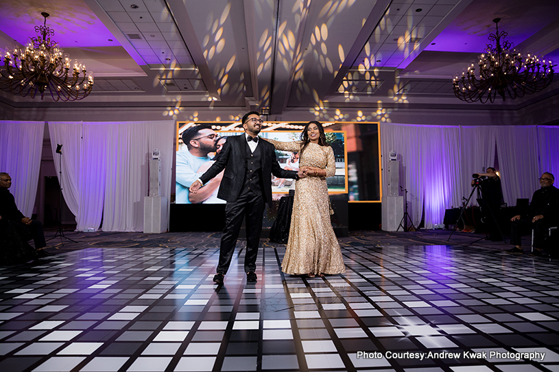 Indian wedding couple dancing together