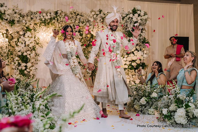 Grand entry of indian wedding couple