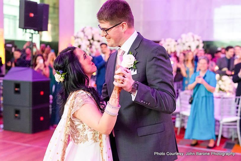 Indian wedding couple's dancing together