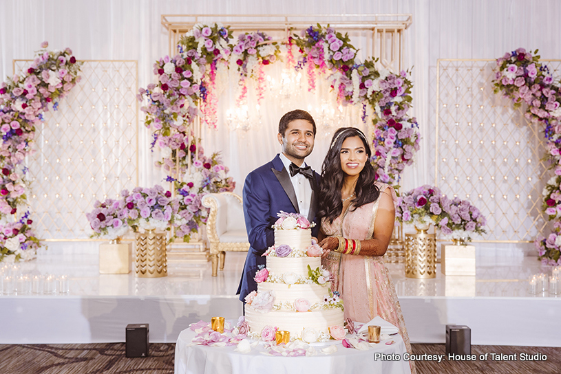 Lovely Indian couple cake cutting  seen